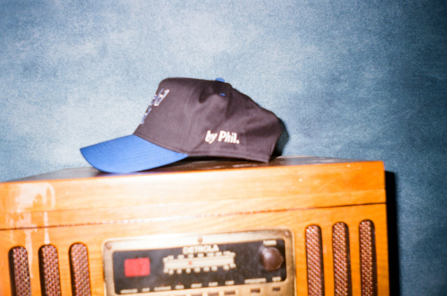 black/blue (white letter) snapback.