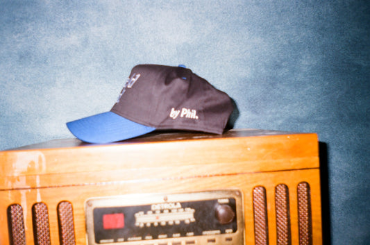 black/blue (white letter) snapback.