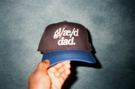 black/blue (white letter) snapback.